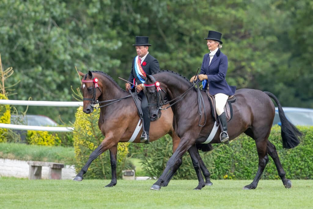 Robert and Sarah Walker on the Champion and Reserve Hacks Parkgate Royal Visit William and Forgelands Hydepark. Photograph by Boots and Hooves Photography